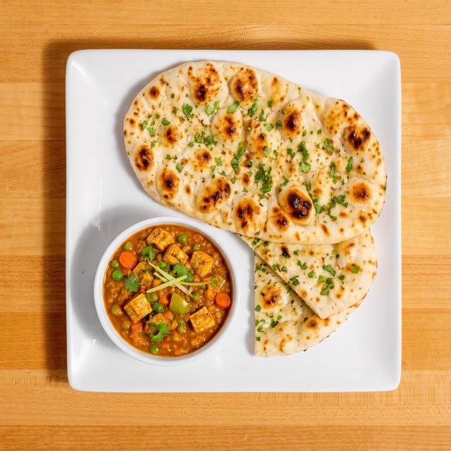 2 Naans + Veg Curry.